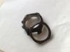 Cassa orologio e lunetta in carbonio forgiato con riccioli d'oro incastonati Cassa orologio e lunetta in carbonio forgiato con riccioli d'oro incastonati